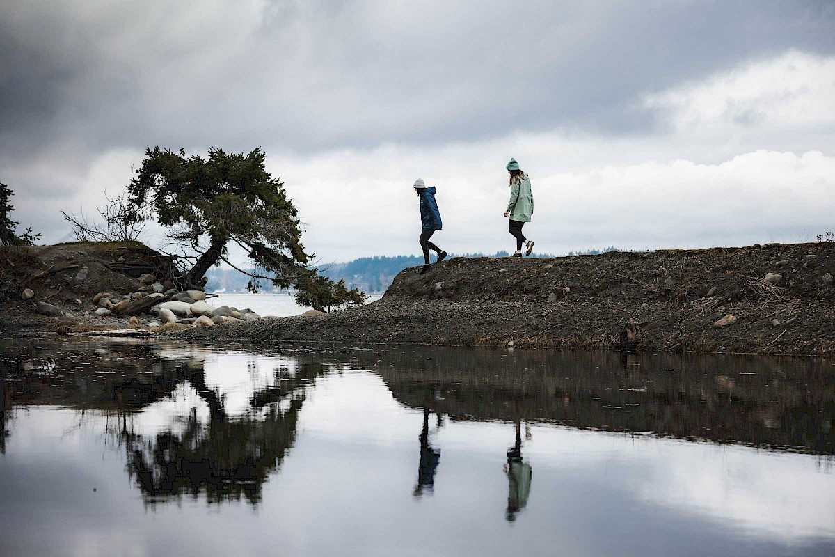 Two people walking on the Royston Seaside Trail