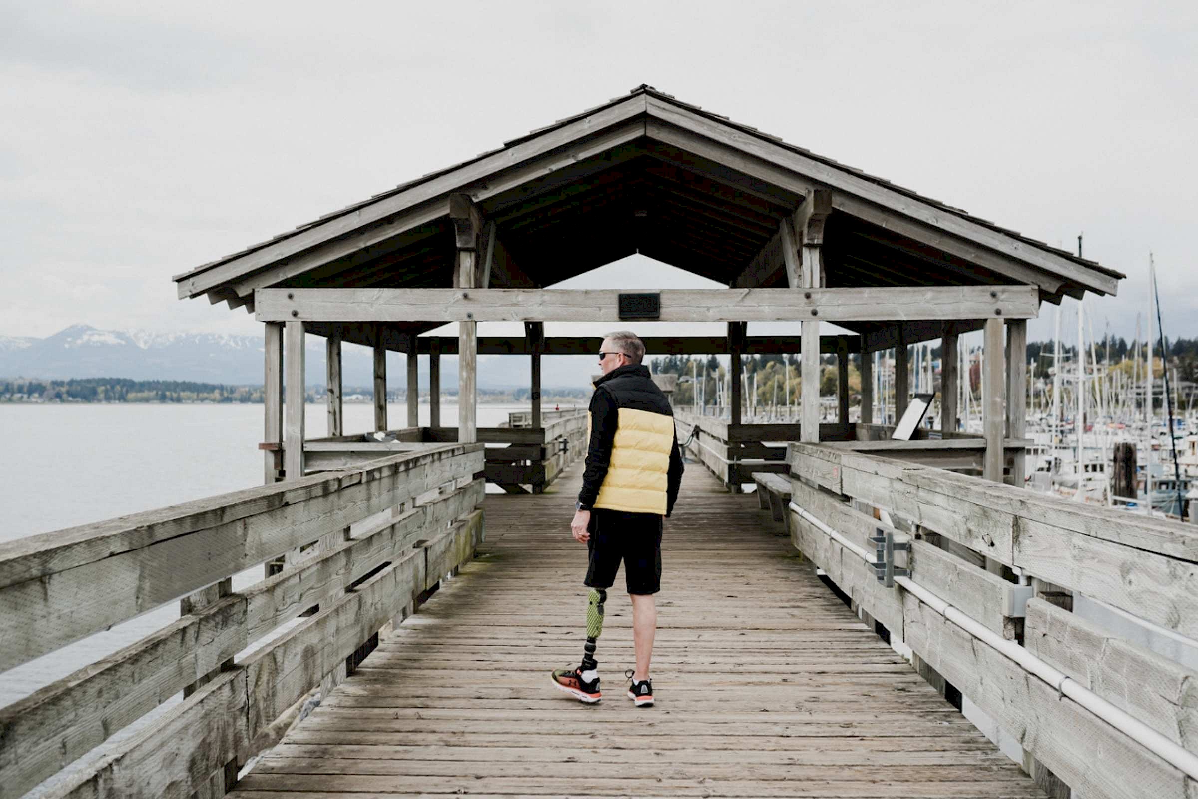 Man walking on wharf